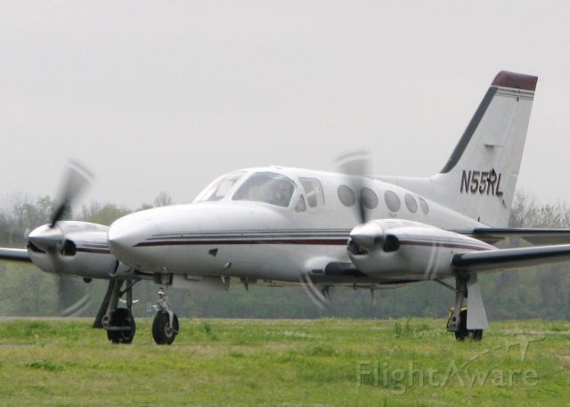 Cessna 421 (N55RL) - Taxiing to runway 14 at the Shreveport Downtown airport.