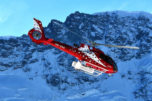Eurocopter EC-130 (HB-ZAZ) - Air Zermatt - Eurocopter EC-130 T2 in front of the Breithorn mountain (13658 ft).br /I took this picture on the Gornergrat (3090 meters above sea level / 10138 ft).br /Photo taken on January 6, 2022 at 10°F.br /And I was on the top of the Breithorn myself 40 years ago :-) Those were the days...br /br /The picture before: https://de.flightaware.com/photos/view/6098442-c6bb1b10e899ddb30a0edc4b44a1c85867418307/aircraft/HBZAZ/sort/votes/page/1br /and the next picture: https://flightaware.com/photos/view/6098442-2da51d78013db77a373022e0ba04b00112fbf4c4/aircraft/HBZAZ/sort/votes/page/1