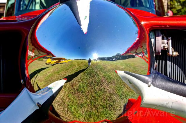 CHAMPION Decathlon (N30GK) - The photographer does a self-portrait in the spinner of Greg Koontzs Super Decathlon at his airstrip.