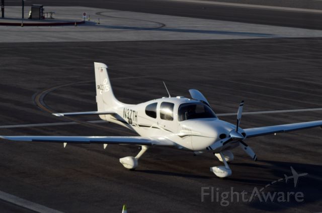 Cirrus SR-22 (N37TH) - Parked at the VGT Terminal after landing on 30L