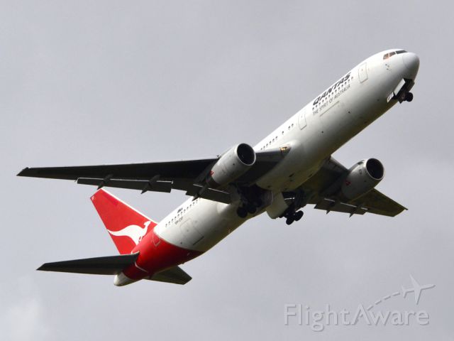 BOEING 767-300 (VH-ZXF) - Getting airborne off runway 23 on a gloomy, cold day. Wednesday, 4th July 2012.