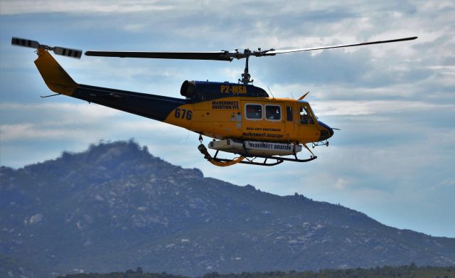 Bell BigLifter (P2-MSA) - Helitac 676 on the way back to Tasmania for the 2017 fire season. Flinders Island, Jan 2017
