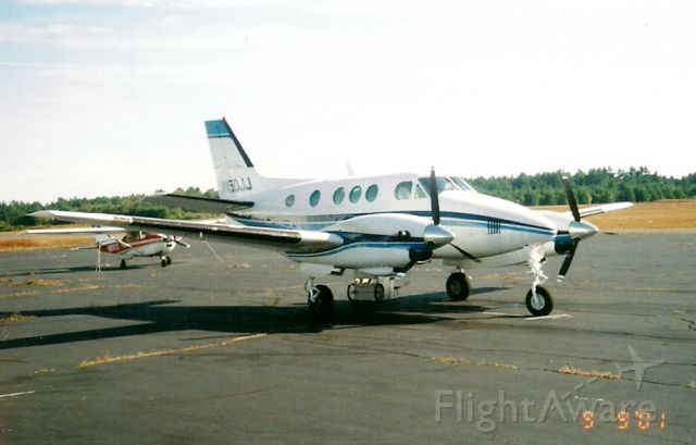 Beechcraft King Air 90 — - "Famous" King Air A90 visiting Jumptown at Orange back in 2001.  This plane was featured in the 1991 movie Point Break with Patrick Swayze and Keanu Reeves.    