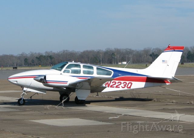 Beechcraft Baron (58) (N223Q) - Parked at the Monroe,LA airport.