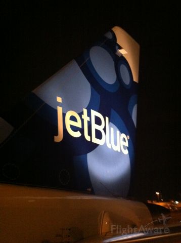 Embraer ERJ-190 — - Here is a shot of JetBlues newest tail on the E190.  Aircraft was sitting at JFK.