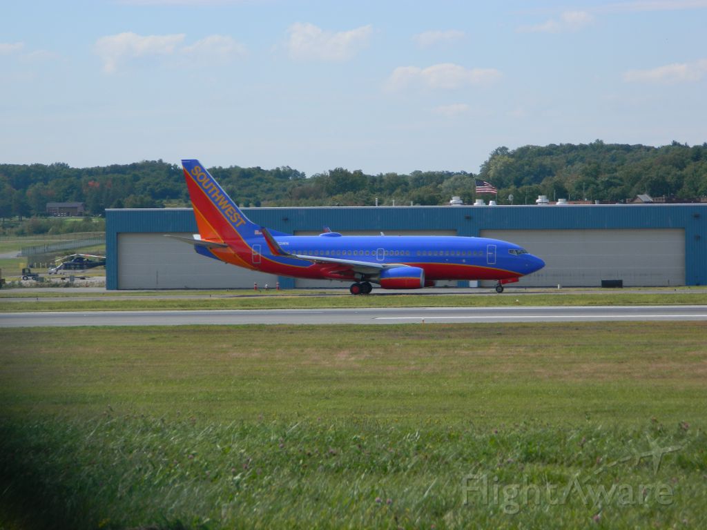 Boeing 737-700 (N903WN) - A Southwest Airlines Boeing 737 taxiing to Runway 19 for departure.