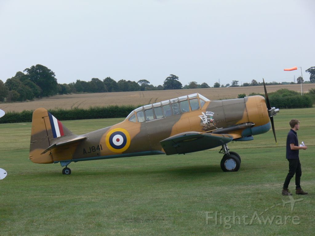 G-BJST — - The photo of North American Harvard IV AJ841 Wacky Wabbit civil registration G-BJST was taken during Shuttleworth Family Airshow on 04 August 2019.