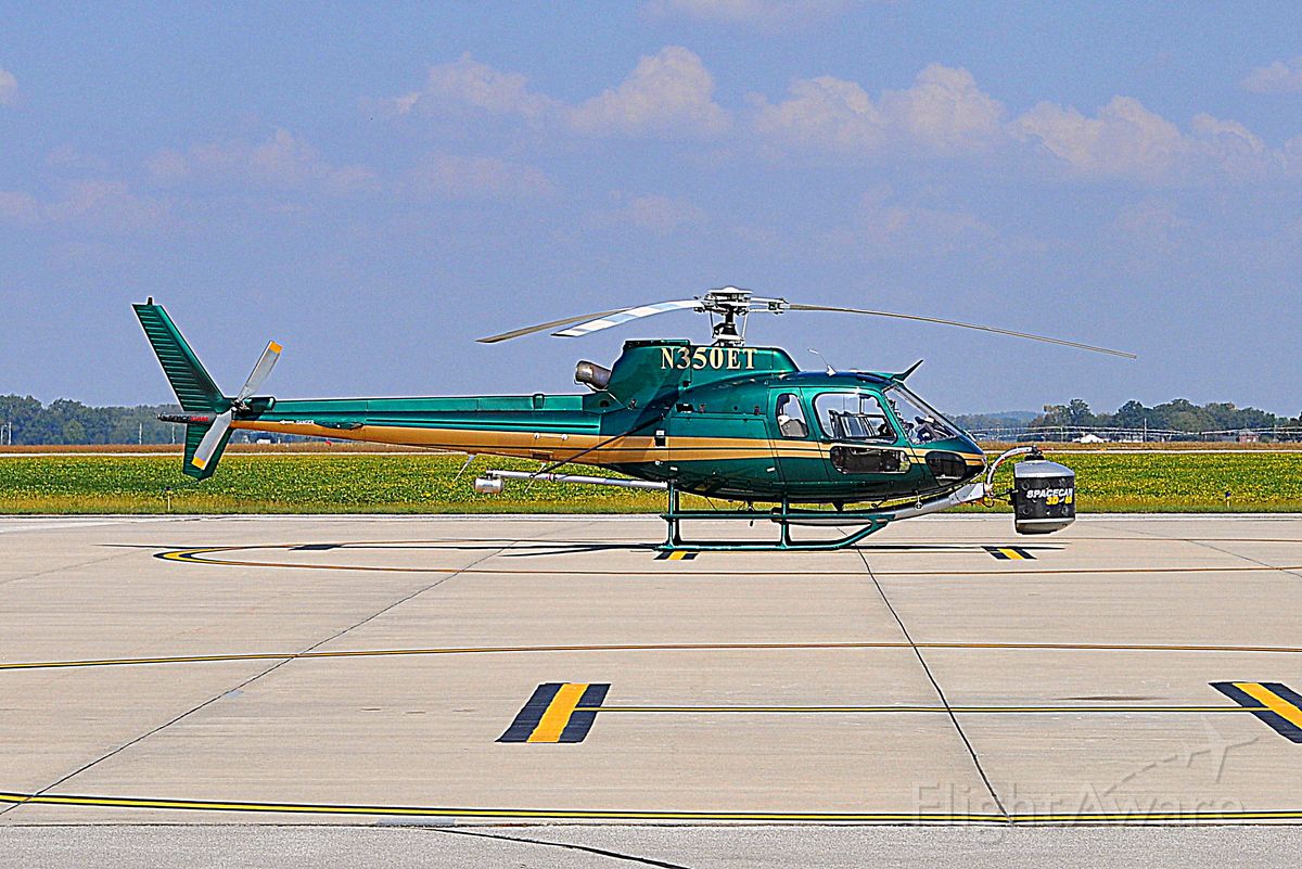 N350ET — - 1998 Eurocopter with gyro stabilized movie camera making a brief stop at Columbus, IN Municipal Airport on 9-26-17.