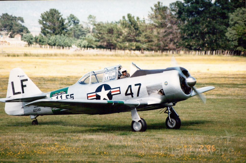 — — - Harvard taxiing at Valleyfield for a solo aerobatic display during the 1996 Skyrace event.br /Pilot is Mike Falls Snr.