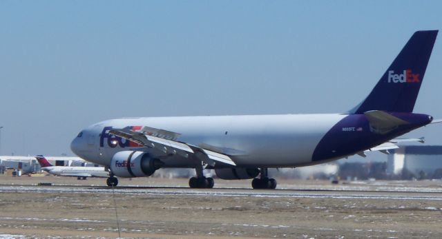 Airbus A300F4-600 (N665FE) - Landed on MEMs runway 36L while an Delta DC-9 taxis by