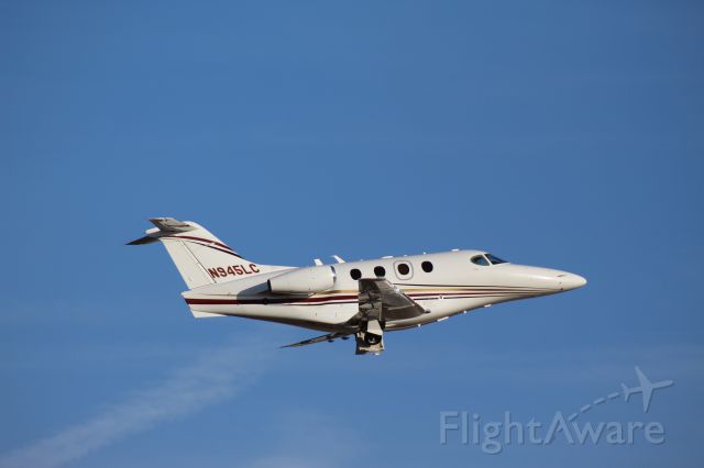 Beechcraft Premier 1 (N945LC) - Blasting out to KLIT on a wondeful February afternoon