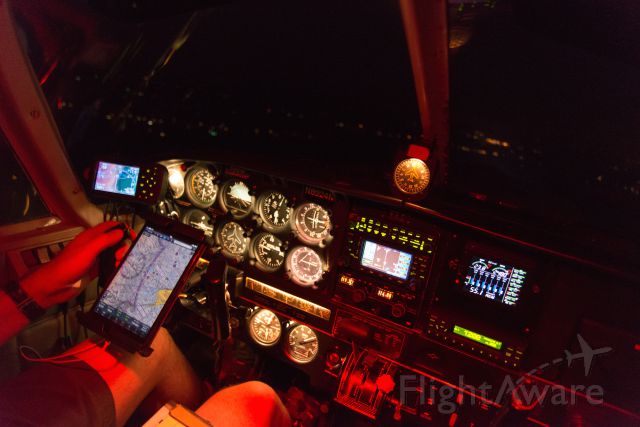 Piper Saratoga (N8924N) - An in-cockpit night shot. ForeFlight is running on the iPad mini, mounted on the yoke using a RAM mount.