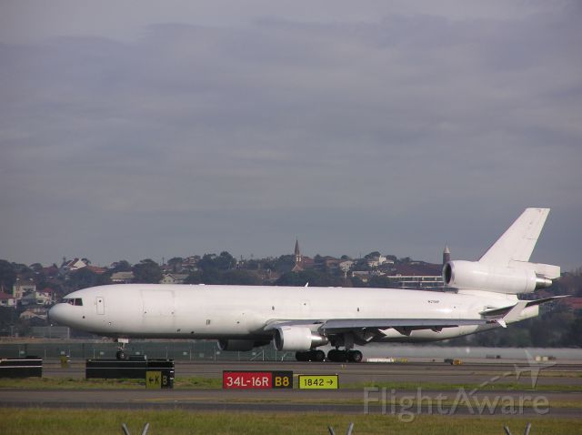 Boeing MD-11 (N278UP) - Seeing this all white MD-11 departing Sydney Australia was bonus photograph taken on 13/06/2005 MSN 48577 LN 583.