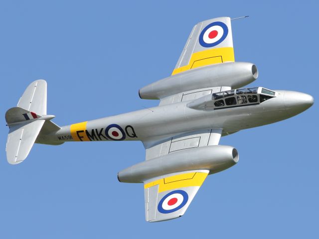 — — - Glouster Meteor performs fly past at Jubilee Weekend at Duxford Air Museum.