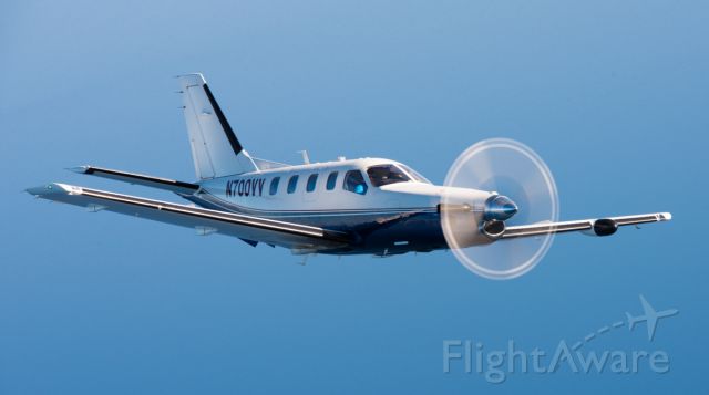 Socata TBM-700 (N700VV) - Flying around Lake Tahoe for a photo shoot.
