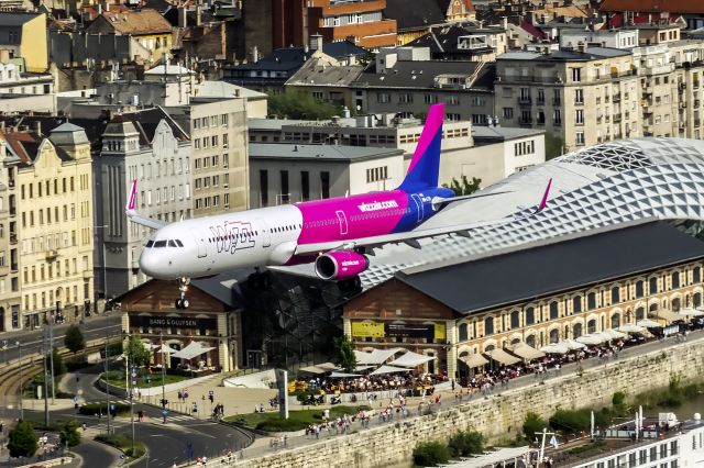 Airbus A321 (HA-LTA) - 2018 May 1 Wizz Air Low pass above river Danube in city center Budapest, Hungary.