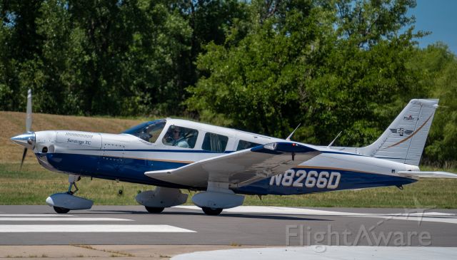Piper Saratoga/Lance (N8266D) - This Turbo Saratoga II was captured while departing Stearman Field (1K1) in Benton, Kansas.  The airport has a restaurant that is a popular stop for breakfast, lunch, and dinner.