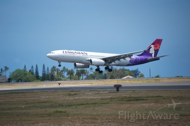 Airbus A330-200 — - Hawaiian Airbus A330 just about to touch down in Honolulu.