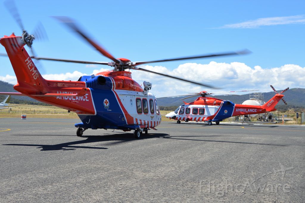 BELL-AGUSTA AB-139 (VH-YXG) - VH-YXG and VH-YXK at Flinders Island after rescuing 6 survivors from a sinking yacht in Bass Strait, 14 Jan 2018
