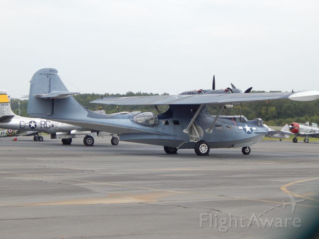 N9521C — - A beautiful PBY Catalina, sits on the ramp at CJR full of warbirds waiting for the WWII flyover. It was cancelled due to rain a few days later.