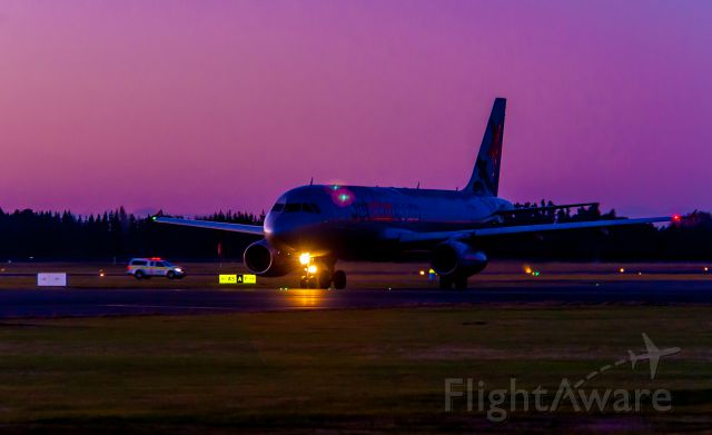 Airbus A320 (VH-VQA) - QANTAS Subsidiary, Jetstar JST-142 taxying for departure on Runway 02 after sunset, bound for Sydney (YSSY). A shame the Fire Rescue guys photobombed my shot at the last few moments!