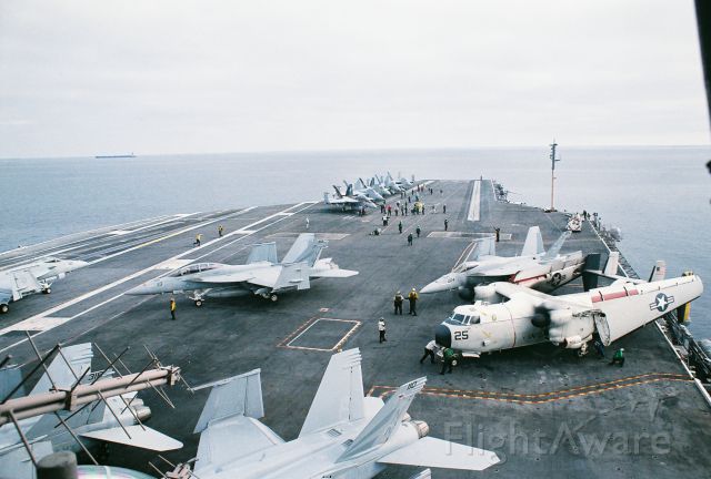 — — - On the deck of CVN76