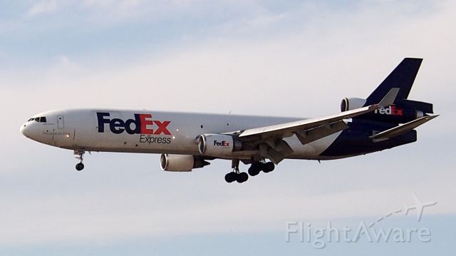 Boeing MD-11 (N584FE) - Short final to 18R. 