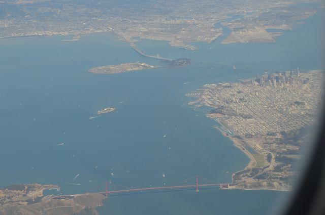 — — - View of downtown San Francisco and Golden Gate Bridge. Landing into SFO, United 59 from Frankfurt.