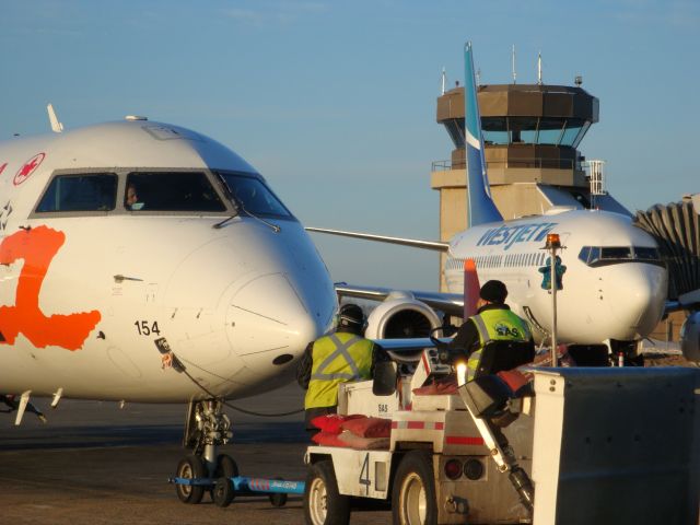 Canadair Regional Jet CRJ-200 — - Busy morning at the CYMM Airport
