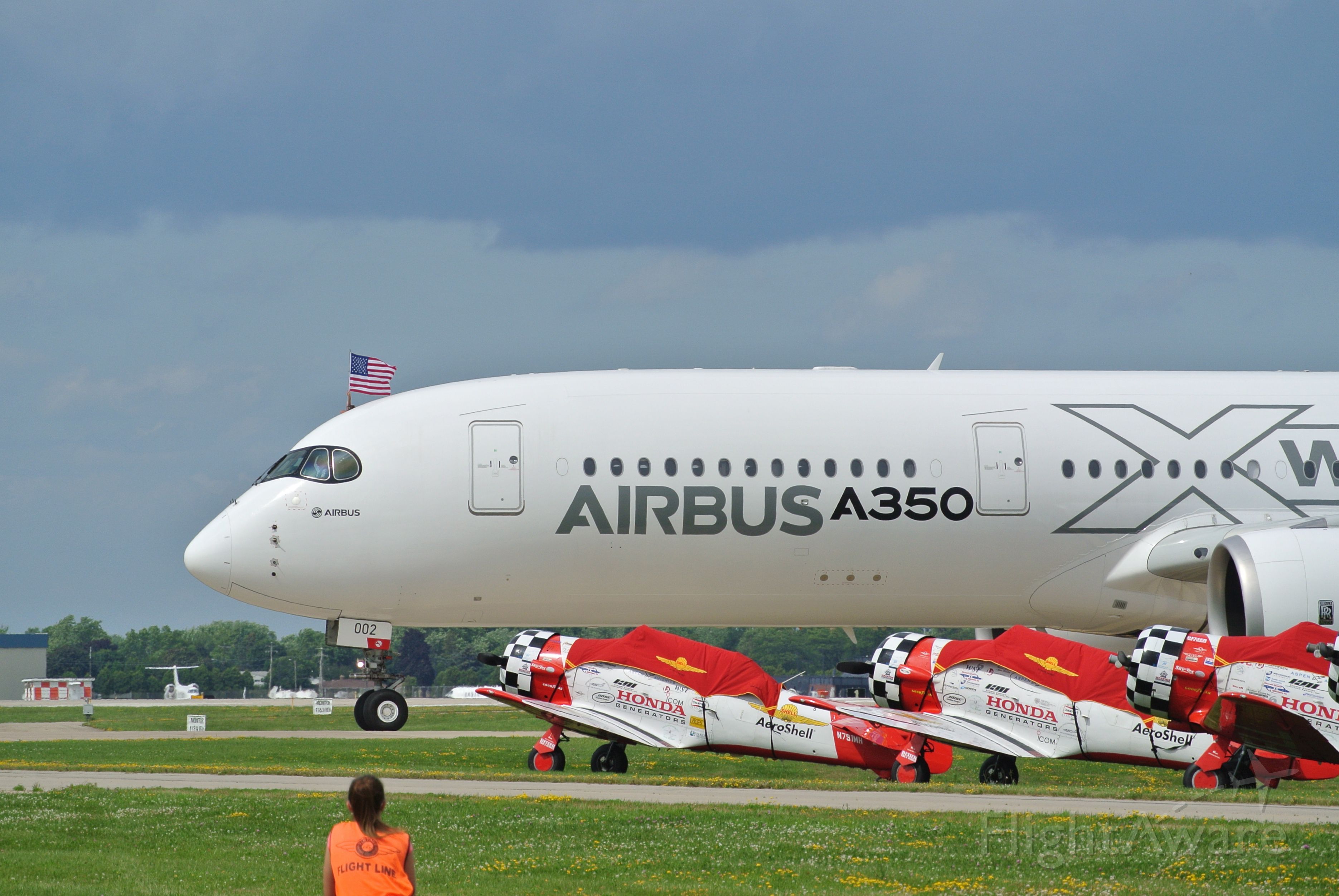 Airbus A350-900 (F-WWCF) - American Flag flying out of the Airbus A350 at Air Venture 2015 after arrival