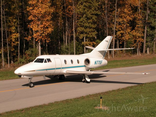 Dassault Falcon 10 (N77SF) - N77SF Taxis to runway 19 Penn Yan New York during a colorful Fall day in Upstate New York
