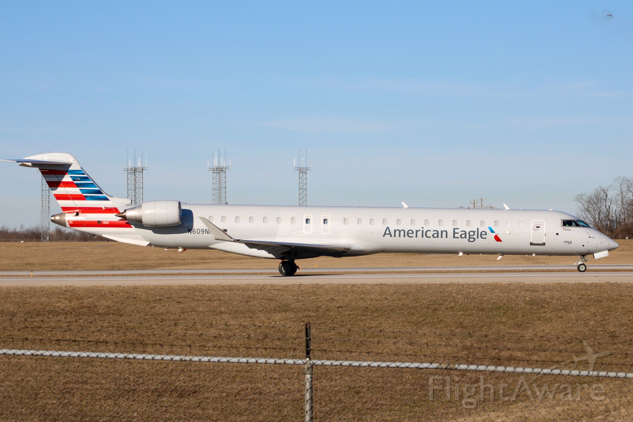 Canadair Regional Jet CRJ-900 (N609NN) - American Eagle CRJ-900 taxiing from the PSA hangar to its gate at CVG. 