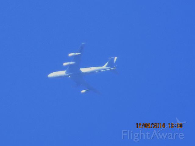 Boeing C-135B Stratolifter (N23503) - I just missed this KC-135 hooked to the B-52 with contrails coming off both of them. I just seen it and got my camera up and they had already broken apart and moving away from each other. Still kicking myself for missing that picture.