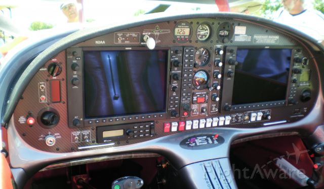 Lancair Legacy 2000 (N2AA) - Garmin 1000 glass in the cockpit of Lancair Legacy N2AA.  Notice the standby instruments in a vertical stack between the screens.