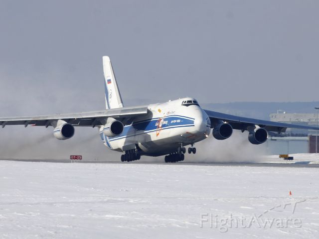 Antonov An-124 Ruslan (RNA82045) - The Russian Blizzard Maker lifting off Runway 14 on Feb 11, 2011 as flight VDA2118 to KNUQ
