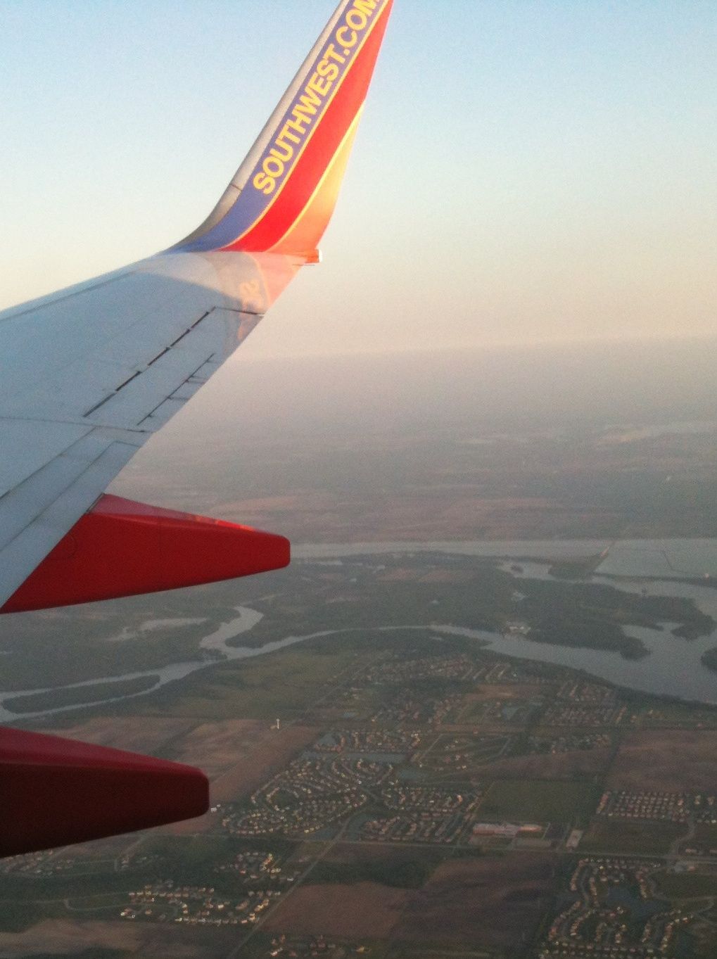 Boeing 737-700 — - On our way into Midway, just before Joliet.. My house is somwhere down there...