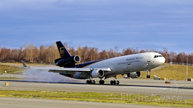 Boeing MD-11 (N292UP) - Shot from the West Access Road at the approach end of RWY 15; Ted Stevens Anchorage International Airport; Anchorage, Alaska, USA