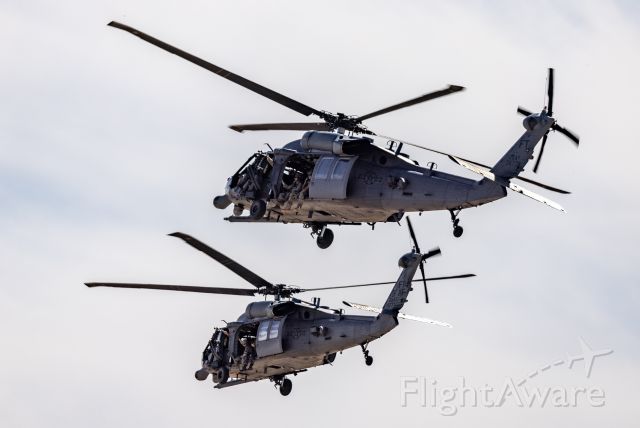 9726777 — - A pair of Sikorsky HH-60G Pave Hawks turning outbound following a demonstration